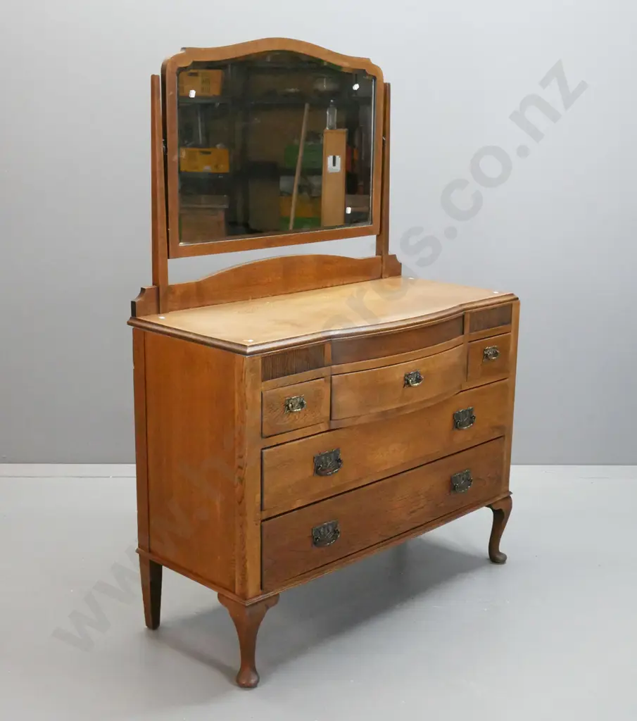 vintage deco style oak 5-drawer mirror-back dresser with shaped bevelled edge swinging mirror on square tapered supports Image 1++