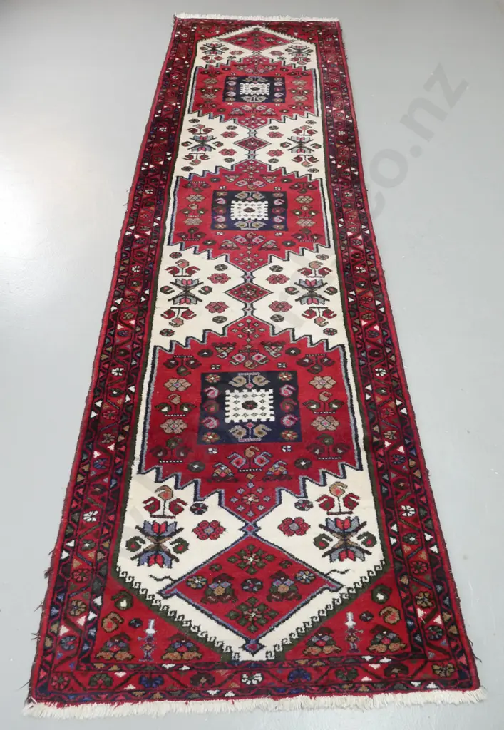 Persian style hand-knotted wool runner - ivory, dark reds and blues - minor staining in lighter areas L2840 W810 Image 1++