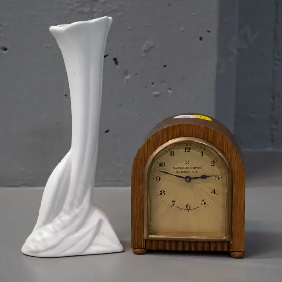 small oak-cased German bedside alarm clock with Dawson's Dunedin markings, and a Crown Lynn bud vase H-170