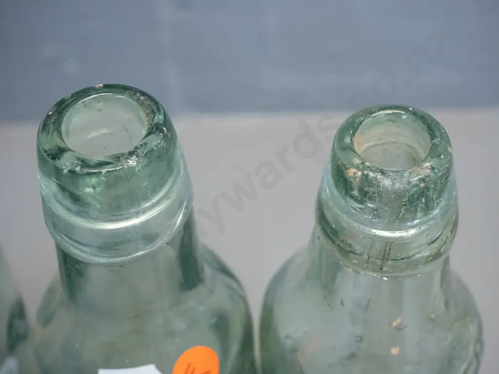 4 vintage glass bottles - two marked H. Mace and Co. Christchurch, Saunders & Co. Christchurch, and an English Image 1++