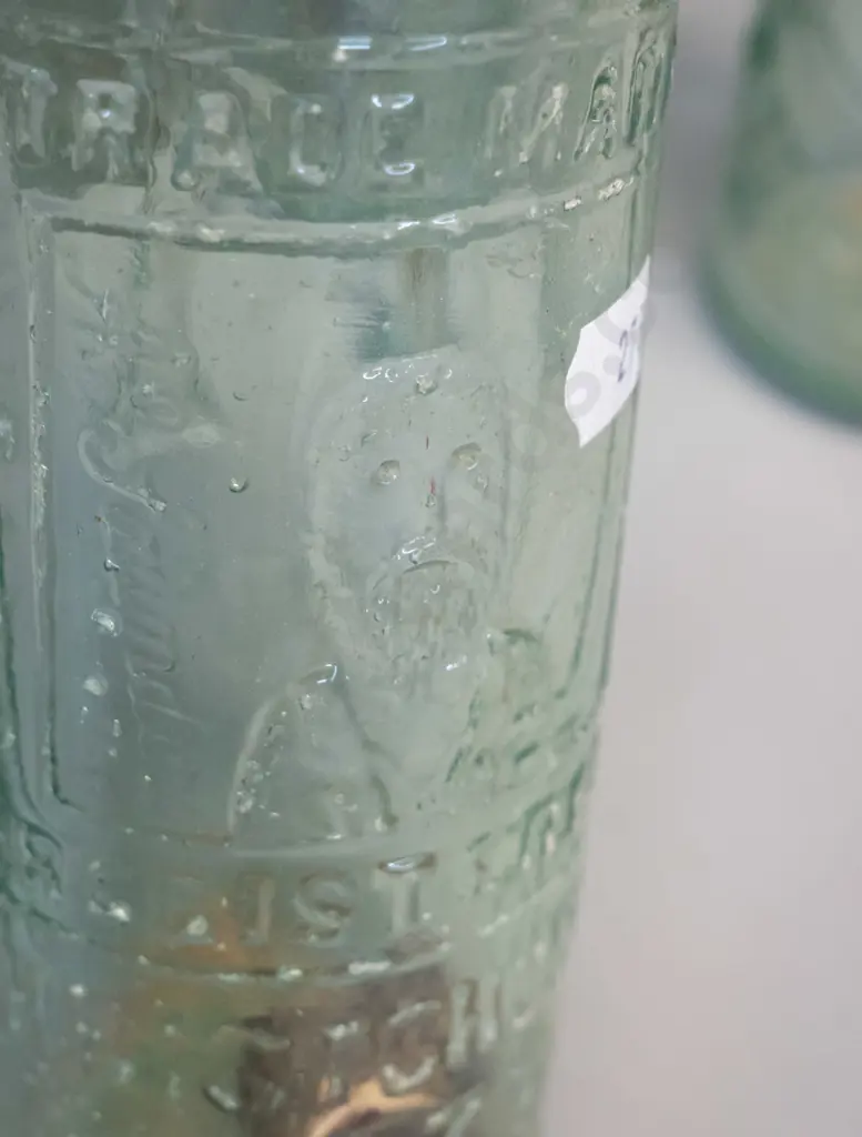 4 vintage glass bottles - two marked H. Mace and Co. Christchurch, Saunders & Co. Christchurch, and an English Image 1++