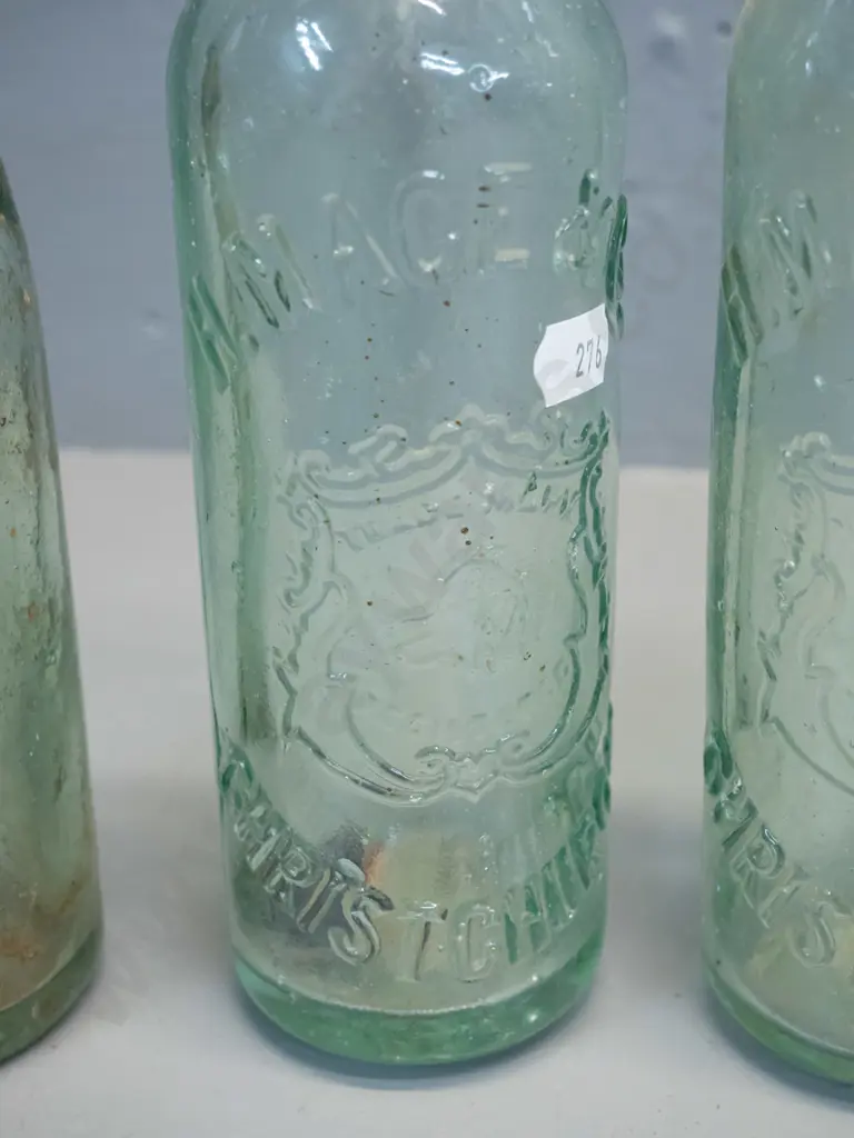 4 vintage glass bottles - two marked H. Mace and Co. Christchurch, Saunders & Co. Christchurch, and an English Image 1++