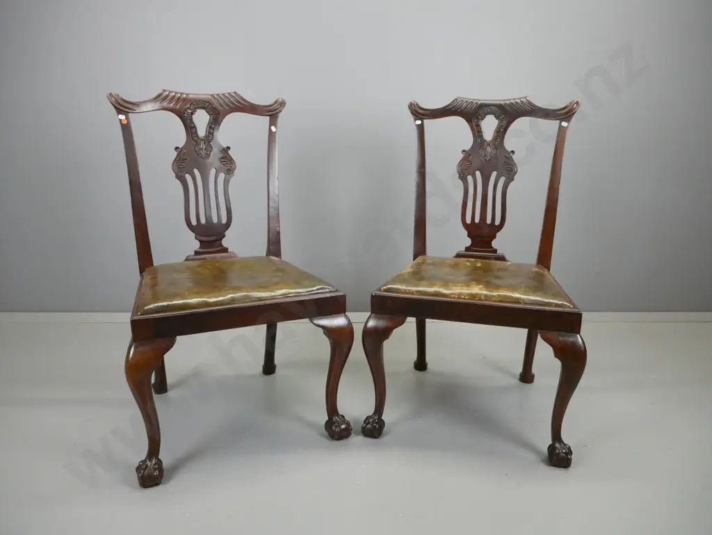 pair of 19th century mahogany Chippendale style chairs with pierced and carved backs, ball and claw feet, w/ olive green Image 1++