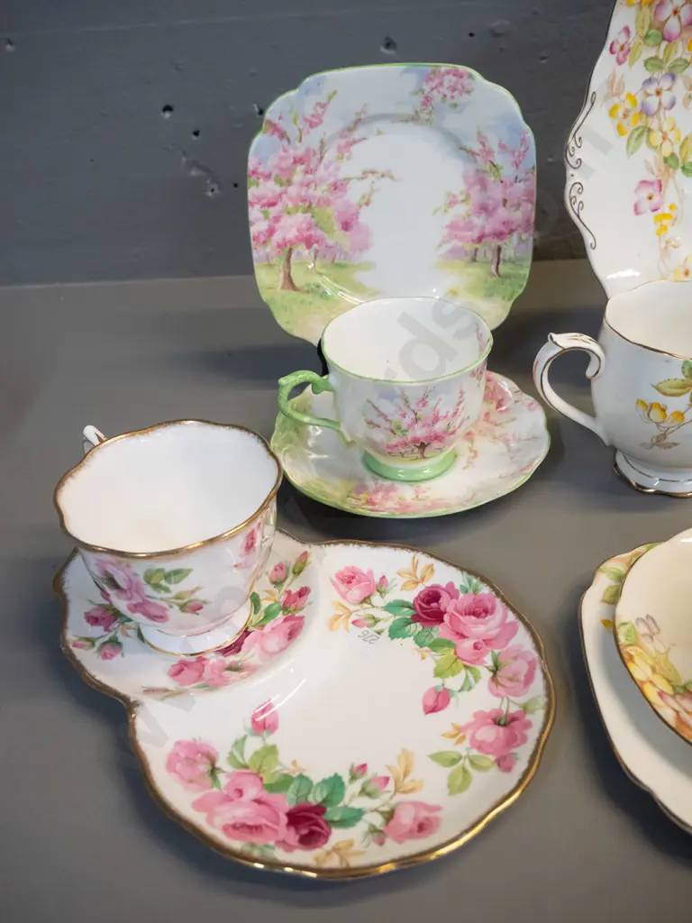 Royal Albert tea ware - "Clematis" pattern 6 trios, cake plate and jug, plus a few spare saucers, a Princess Anne tennis Image 1++