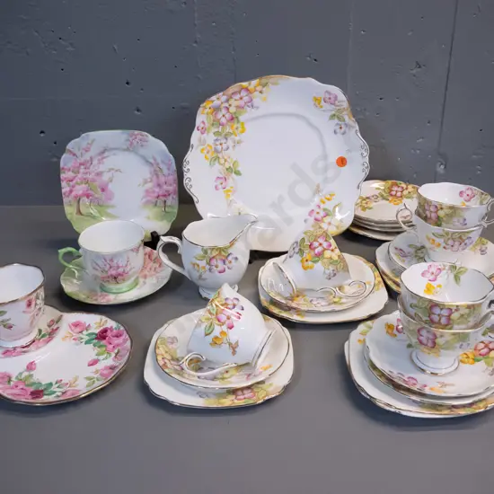 Royal Albert tea ware - "Clematis" pattern 6 trios, cake plate and jug, plus a few spare saucers, a Princess Anne tennis