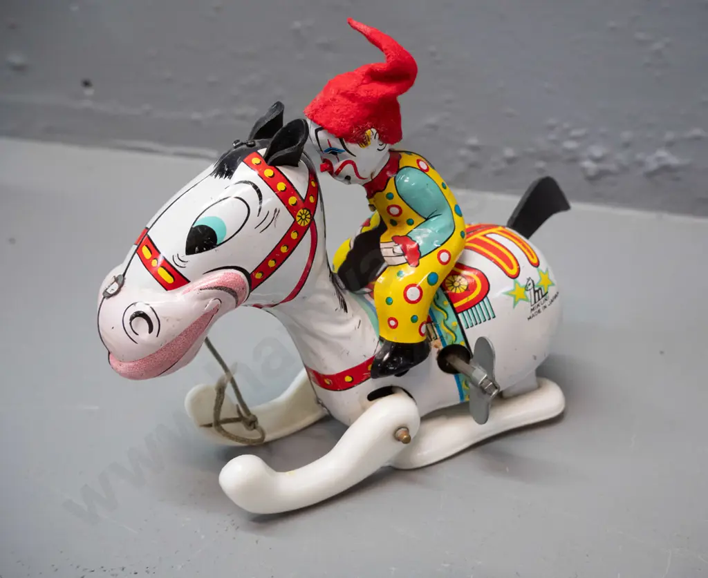 retro Smiths children's Noddy character alarm clock and a small wind up Mikuni Japanese tin toy with plastic legs. Clock Image 1++