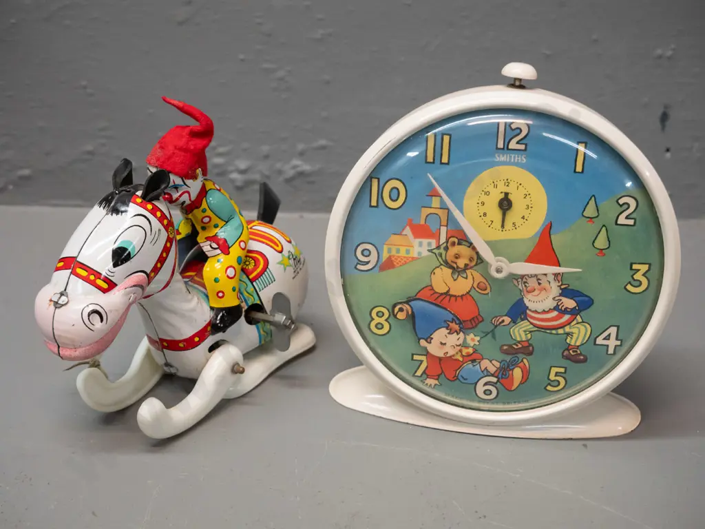retro Smiths children's Noddy character alarm clock and a small wind up Mikuni Japanese tin toy with plastic legs. Clock Image 1++