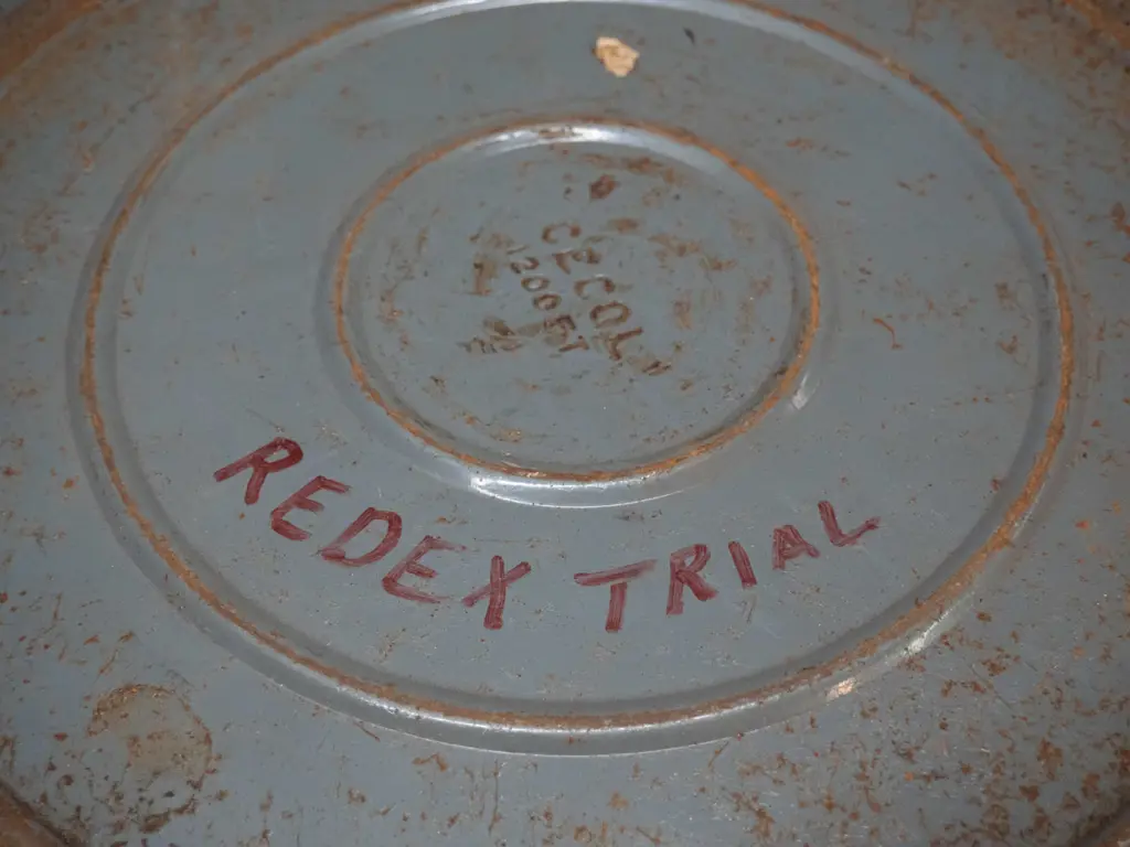 4 vintage film reels in cans and 2 spare reels - 3 are marked Redex Trial (mid 1950s Australian endurance automotive Image 1++