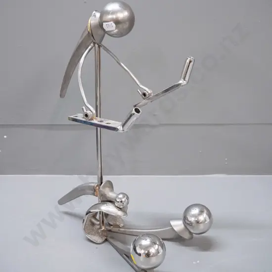 unusual figure made from chromed metal replacement hip joints H-350