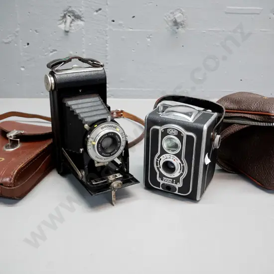 2 vintage film cameras with cases - Ising "Pucky 1" 120 box camera H-110 and a folding Kodak 620 Brownie