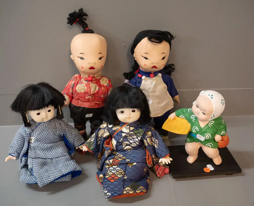 5 asian dolls - large fabric pair marked made in Hong Kong, pair seated porcelain & fabric, and a small ceramic figure Image 1++