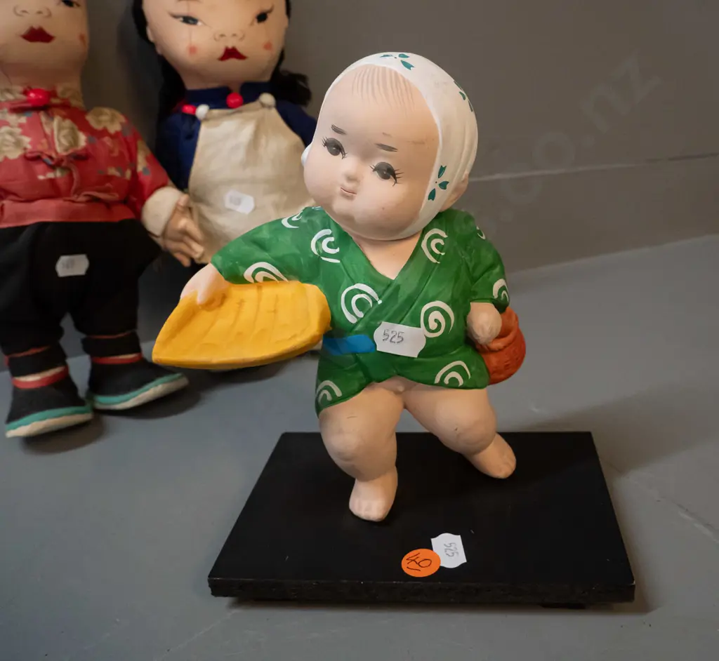 5 asian dolls - large fabric pair marked made in Hong Kong, pair seated porcelain & fabric, and a small ceramic figure Image 1++