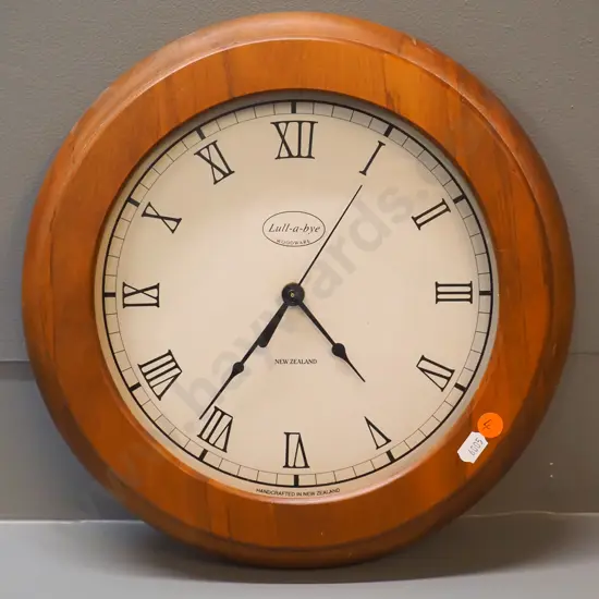 Lull-a-bye New Zealand made rimu framed wall clock with battery quartz movement D-310 GOING