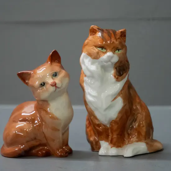 2 cat figurines - Royal Worcester H-100 and Beswick