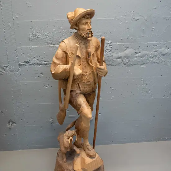 large carved timber figure - antique style hunting man with dog - break to gun barrel with repair H-810