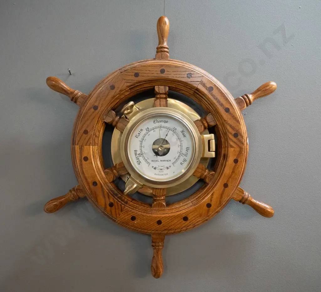reproduction oak ship's wheel and cast brass porthole wall barometer. Marked Royal Mariner, Made in Taiwan sticker D-470 Image 1++