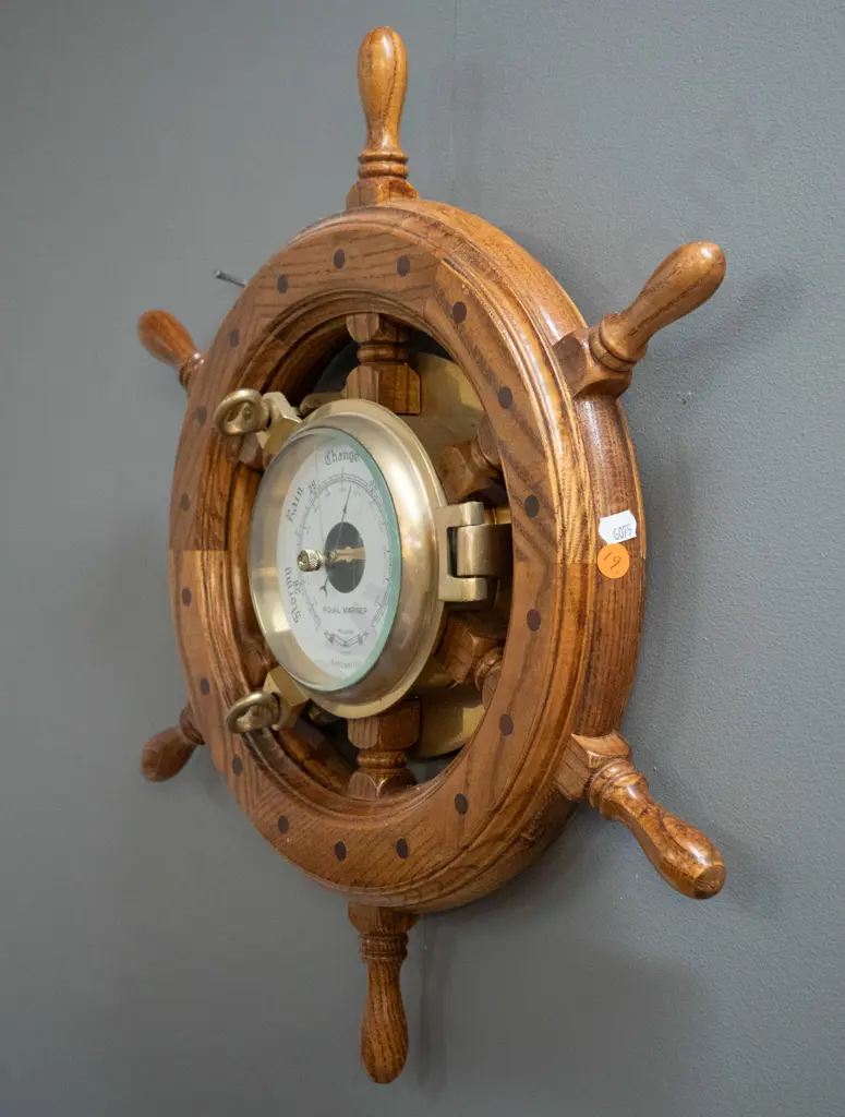reproduction oak ship's wheel and cast brass porthole wall barometer. Marked Royal Mariner, Made in Taiwan sticker D-470 Image 1++