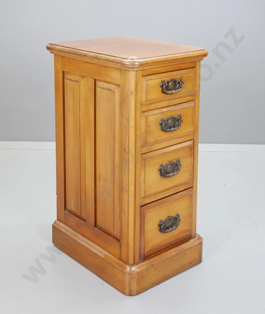VIctorian rimu 4-drawer pedestal / small chest with pressed metal handles, panelled sides, on plinth base. Has filled Image 1++