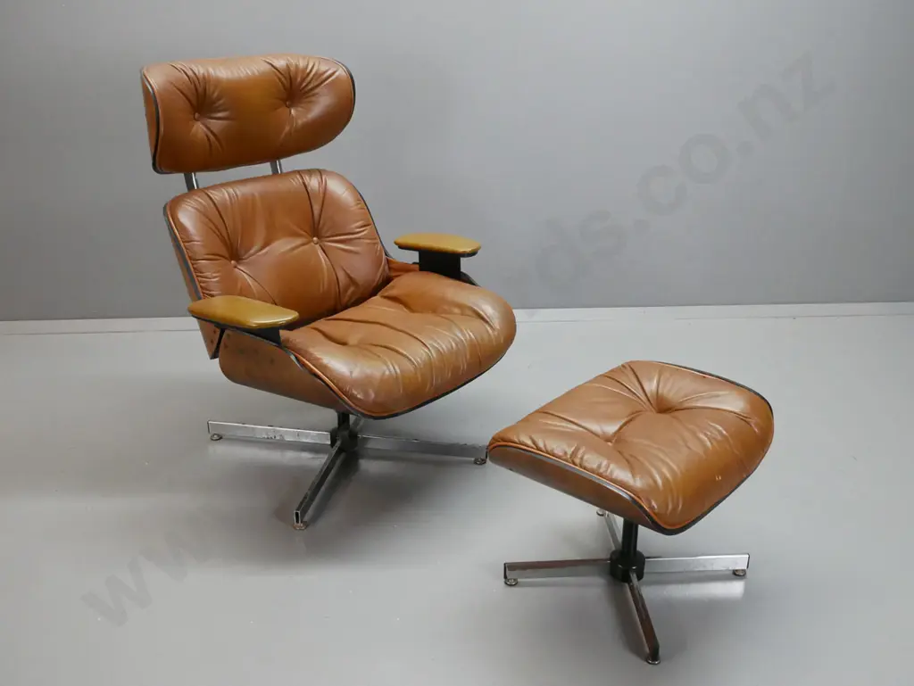 vintage Eames style leather upholstered swivel lounge chair with matching footstool, vinyl upholstered arms. Missing Image 1++