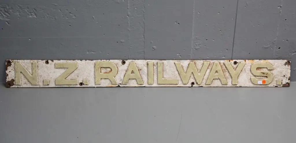 painted cast metal raised lettering N.Z. Railways with screw holes for mounting. Corrosion and paint chipping H100 W1000 Image 1++
