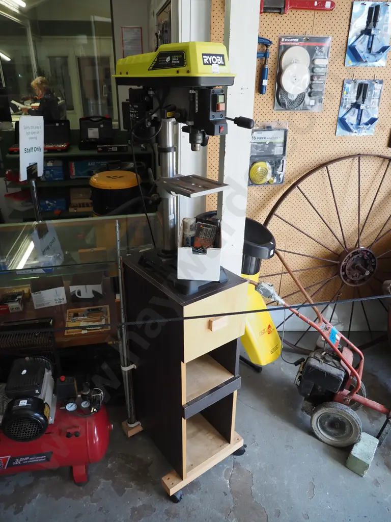 Ryobi 5 speed drill press on homemade stand with box of drill bits and rods Image 1++