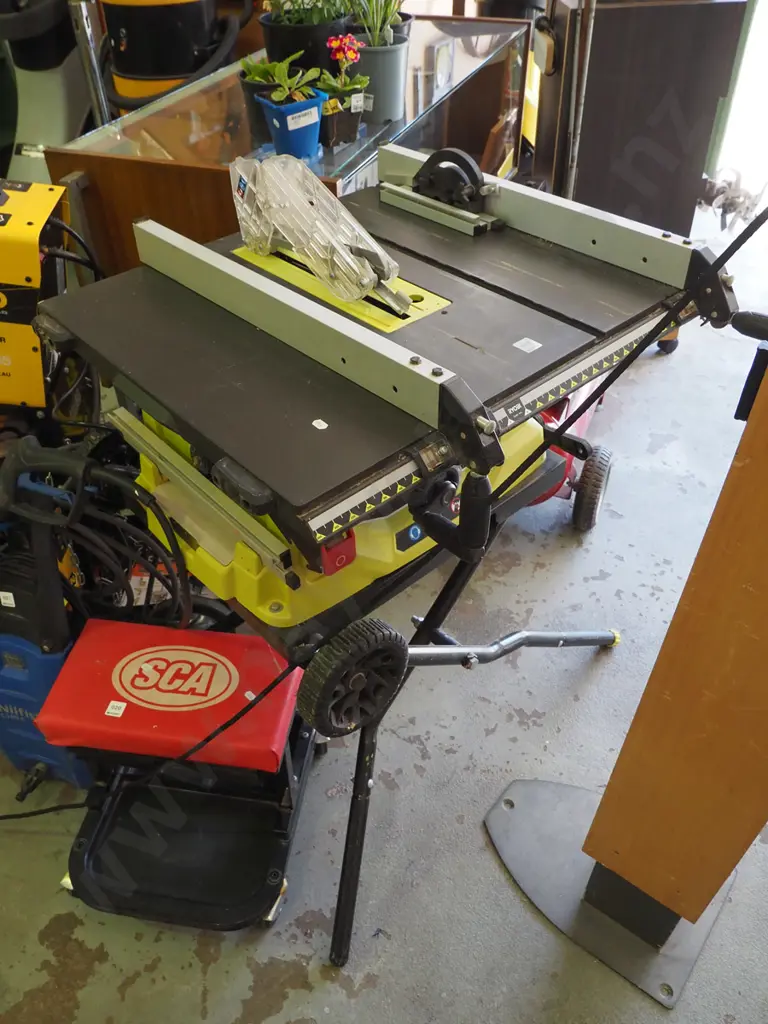 Ryobi bench saw on collapsable stand Image 1++