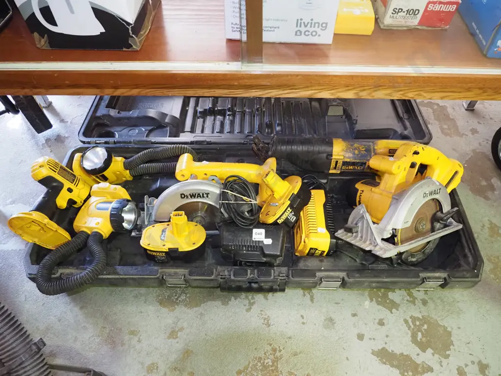 De Walt plastic cased battery tool set; skilsaws, reciprocationg, drills, batteries, chargers Image 1++