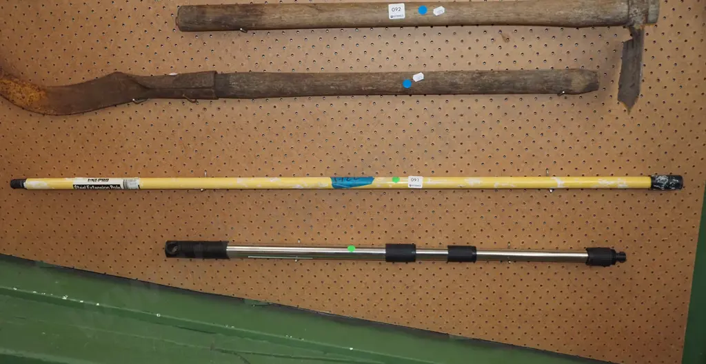 2x telescopic extending poles - green dots Image 1++