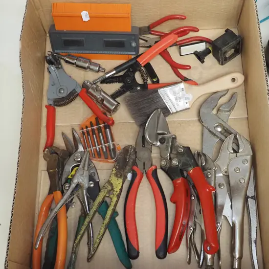box; tin snip, vice grips, pliers etc