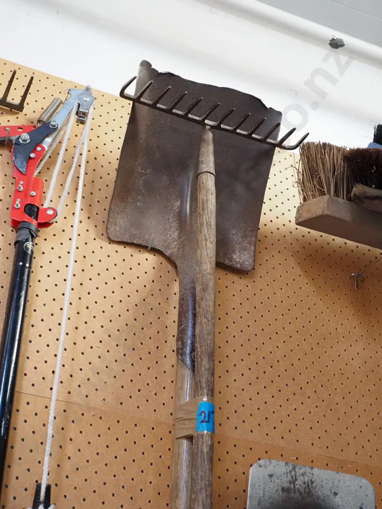 rusty wide mouth shovel, rake Image 1++