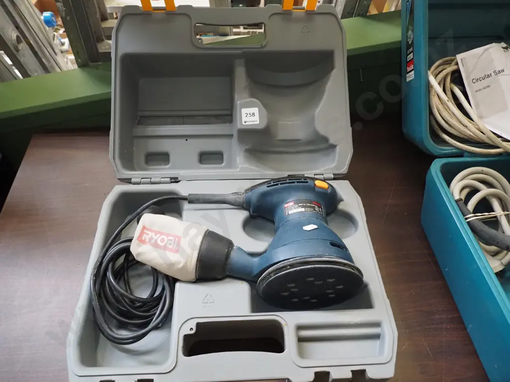 cased Ryobi orbital sander Image 1++