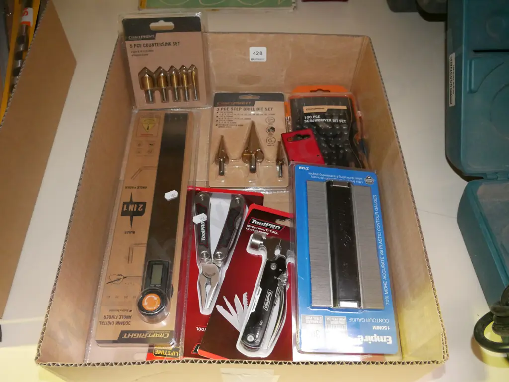 box; screwdriver bit set, angle finder, contour gauge etc Image 1++