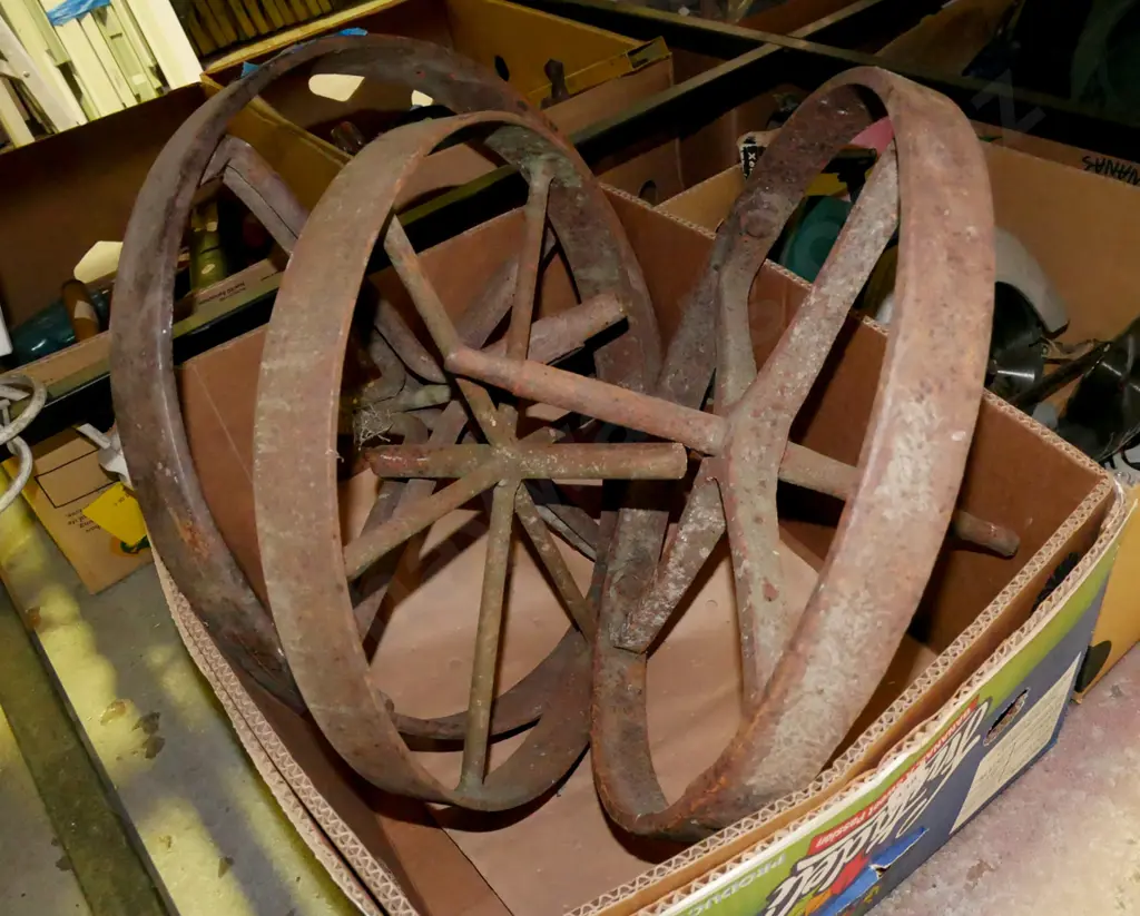 box of 3x rusty vintage wheelbarrow wheels Image 1++
