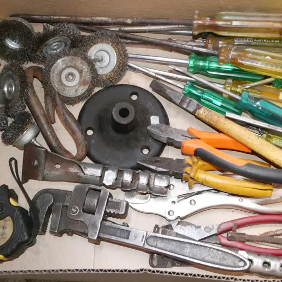 box; screwdrivers, pliers, wire brushes etc