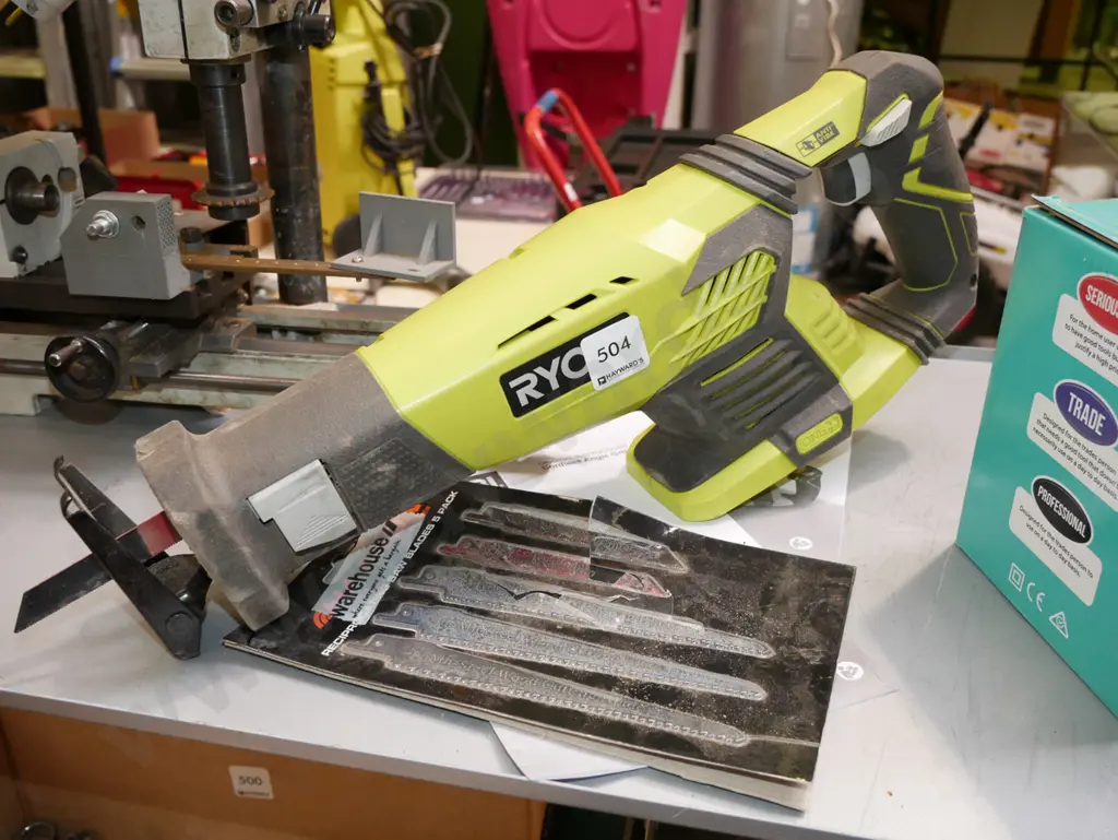 Ryobi battery powered reciprocating saw with additional blades - no battery Image 1++