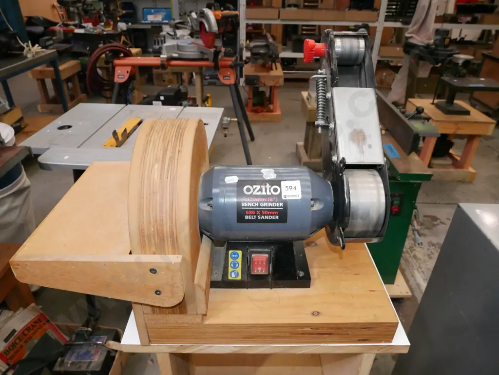 Ozito bench grinder and belt sander on homemade wooden stand Image 1++