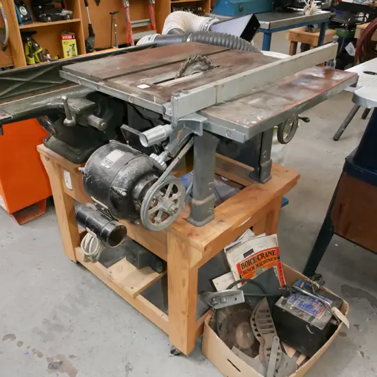 Walker Turner bench saw and 150mm buzzer - has wooden stand and box of accessories 