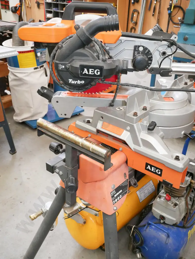 AEG sliding drop saw with matching foldaway stand Image 1++