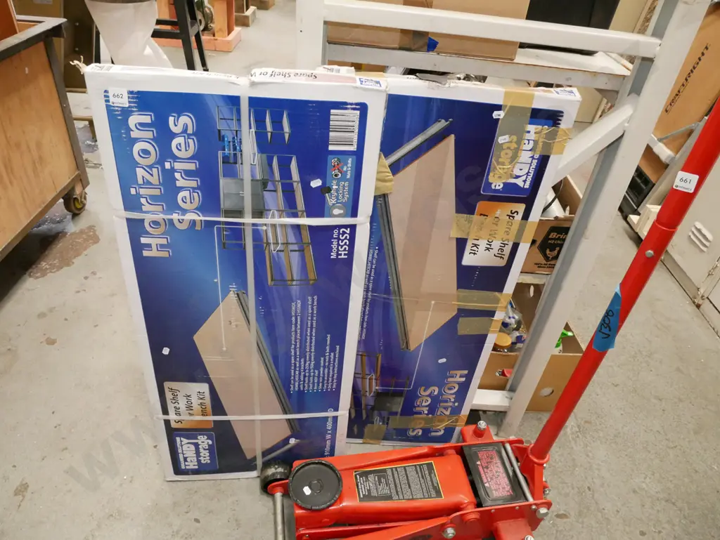 2 boxes of yet to be assembled garage shelving Image 1++