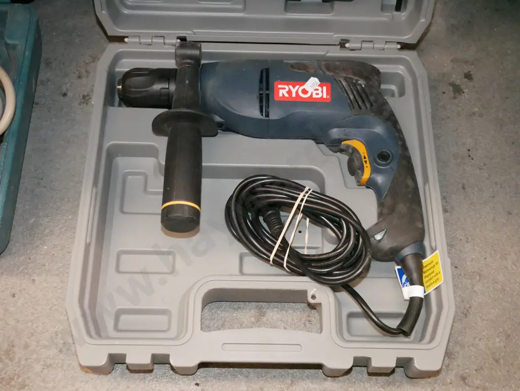 cased Ryobi drill Image 1++