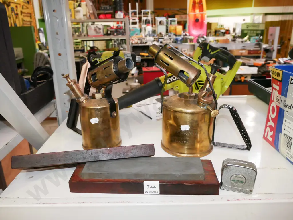 2x brass blow torches, sharpening stone, tape measure Image 1++