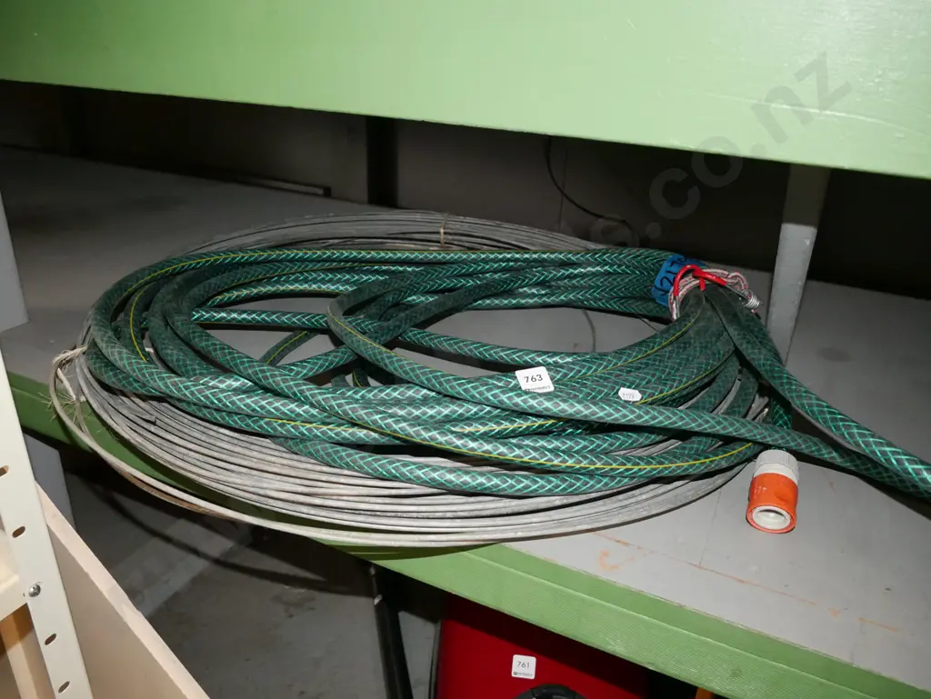 garden hose, roll of metal wire Image 1++