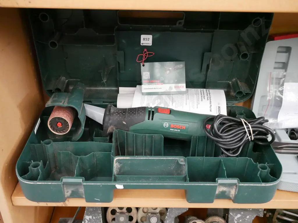 cased Bosch hand held drum sander Image 1++