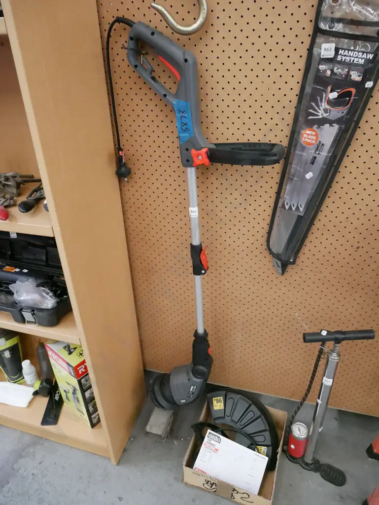 corded Ozito line trimmer and accessories Image 1++