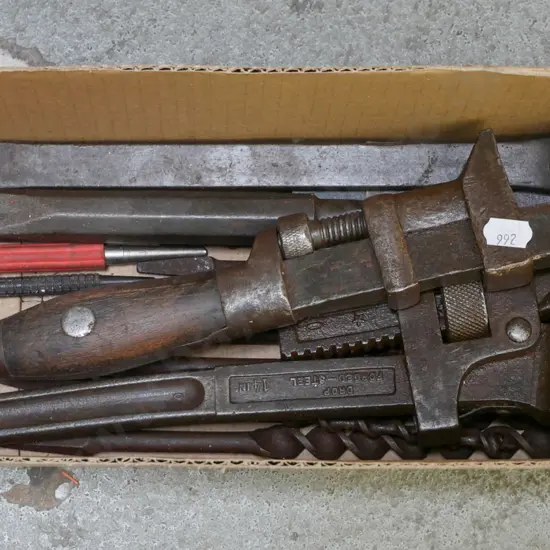 box; cold chisels, auger bits, stilsons etc