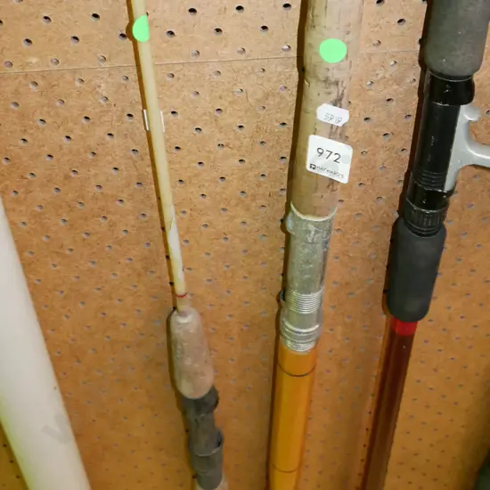 2x fishing rods, plastic rod containers - green dots