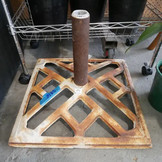 heavy cast metal umbrella stand - some rust