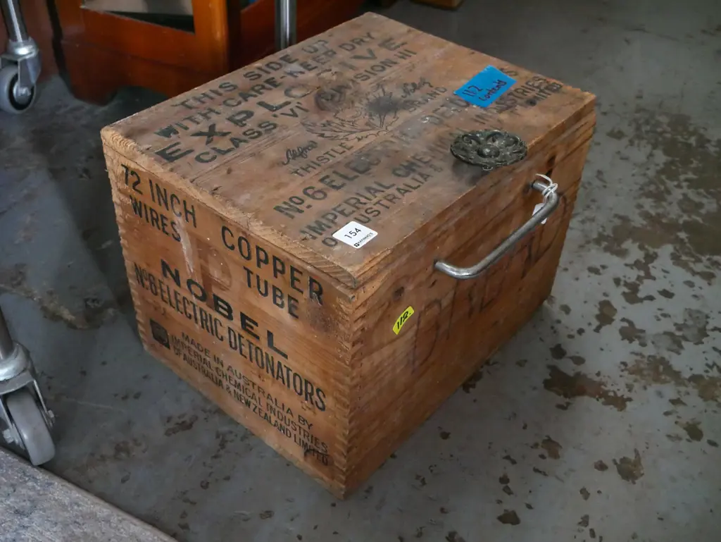 homemade wooden box - some borer - with watering can roses, light switches, trowel, etc. Image 1++