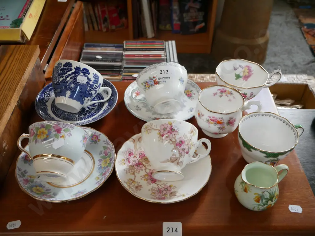 various cups, saucers, small creamer Image 1++