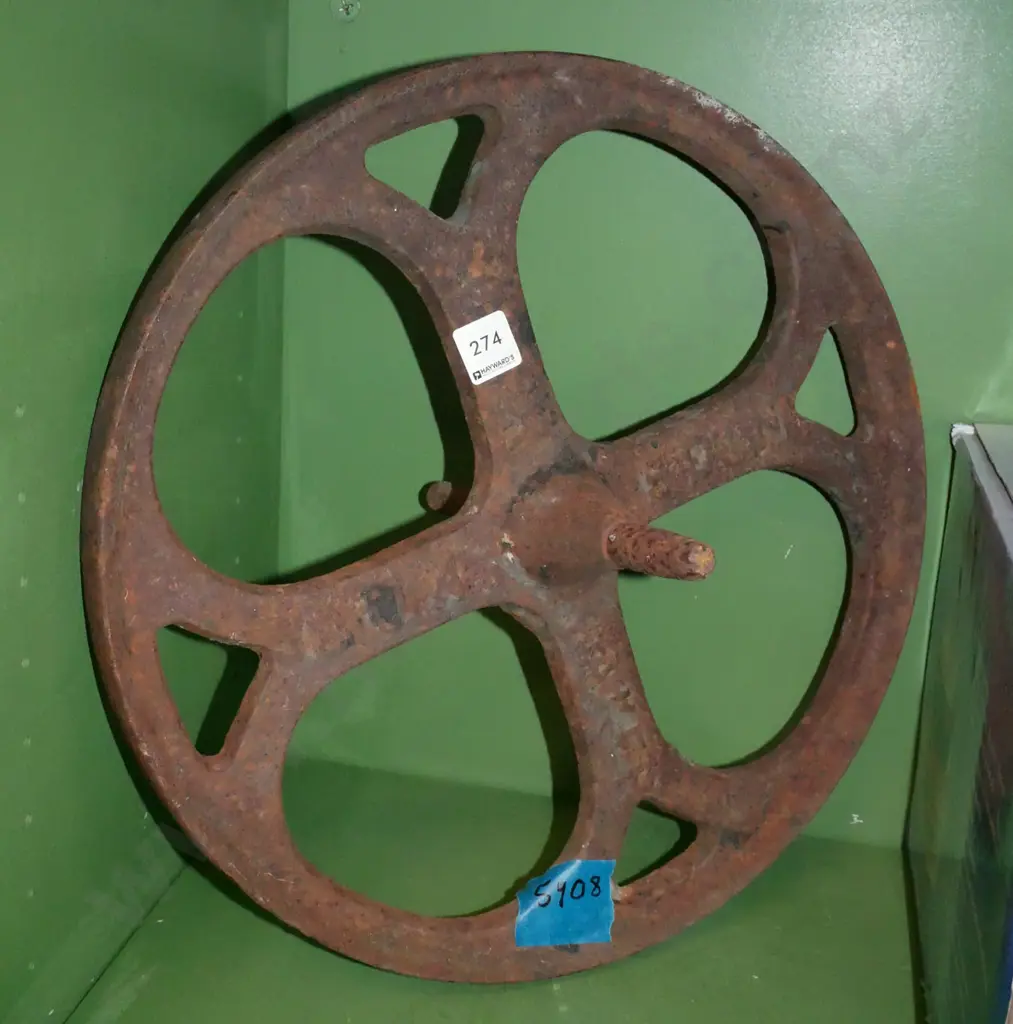 Dunedin made cast iron vintage wheelbarrow wheel Image 1++